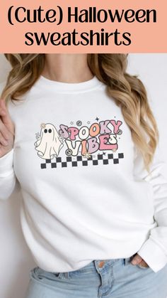 Get into the spooky vibes with this super cute Halloween sweatshirt Cute Cotton Halloween Sweatshirt, Spooky Crewneck Sweatshirt, Spooky Halloween Crew Neck Top, Spooky Halloween Crew Neck Sweater, Stay Spooky Sweatshirt, Halloween Shirts, Spooky Vibes, Halloween Sweatshirt, Cute Halloween