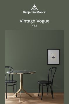 an image of a table and two chairs in front of a green wall with the words vintage voque on it