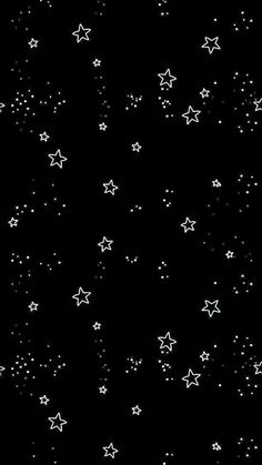 white stars are scattered on a black background