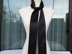 This extra long skinny black scarf is made by cotton viscose jersey, and creates a beautiful and lovely picture for you to wear with your favorite outfit. It has the perfect length to wear in different ways like as a skinny scarf,  tie around your neck, on your head wrap or as a belt.  So many ways to wear it! Wash gently in cold water. It's a wonderful gift choice for everyone. Check also my other silk scarves: https://www.etsy.com/shop/ArtTetisCollections Ready to ship. Thank you for visiting my shop. Scarf Head Wrap, Scarf Tie, Scarf Head, Black Neck, Head Wrap Scarf, Fits Inspo, Wrap Belt, Black Scarf, Belt Accessories