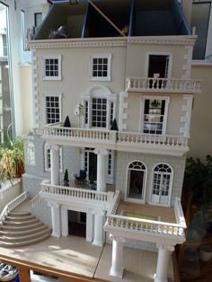 a large doll house sitting on top of a table