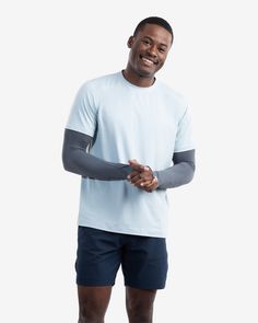 Man wearing smoke color unisex sleeves with short sleeve soft grey crew shirt. (Style 5005) - BloqUV Upf 50+ Crew Neck Rash Guard For Summer, Stretch Crew Neck Rash Guard With Upf 50+, Stretch Rash Guard With Upf 50+ And Crew Neck, Long Sleeve Moisture-wicking Rash Guard For Summer, Moisture-wicking Long Sleeve Rash Guard For Summer, Summer Long Sleeve Moisture-wicking Rash Guard, Casual Rash Guard With Uv Protection For Sports, Sporty Rash Guard For Summer Outdoor Activities, Sporty Summer Rash Guard For Outdoor