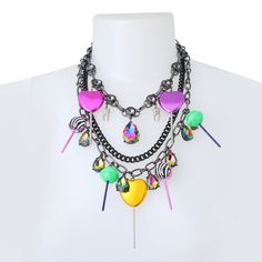 Statement layered necklace featuring striking mixed chains adorned with colorful lollipops, playful pave teeth, and glistening stone gems. The necklace has an adjustable lobster clasp closure made from metal, plastic, and glass. Lobster clasp closure Approx. 16"-22" + 3" Extender Approx. Frontal Drop: 6.75" Not intended for children 13 yrs of age and younger Lady Stardust, Betsey Johnson Necklace, Fierce Women, Halloween Necklace, Popular Handbags, Aesthetic Things, Indie Aesthetic, We Wear, Wearing Black