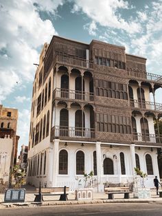 an old building with many balconies on it