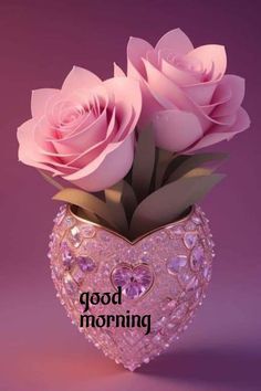 pink roses in a heart shaped vase with the words good morning