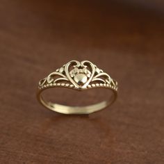 Christmas Sale, Heart Ring, Brass Ring, Love Ring, Filigree Heart Ring, Unique Ring, Gold Heart Ring, Gift For Her, Cute Ring For Women Material:- Brass Size:- Any ♥Brass, unlike gold, is a metal that can oxidize over time. To avoid and delay this oxidation, I recommend that you do not sleep with your jewels, and not expose them to water. The ring can be customized on request and the gemstone can be made to any gemstone you want. Same Design Ring Are Upload With Any Gemstone. Please Visit Our Sh Gold Round Crystal Promise Ring, Gold Plated Birthstone Promise Ring, Gold Gemstone Stackable Rings For Promise, Gold Stackable Promise Rings With Gemstones, Gold Gemstone Midi Rings For Wedding, Gold Heirloom Crystal Ring With Birthstone, Heirloom Gold Crystal Ring With Birthstone, Heirloom Gold Crystal Birthstone Ring, Gold Crystal Gemstone Promise Ring