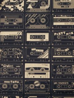 a bunch of old radio cassettes on a black background