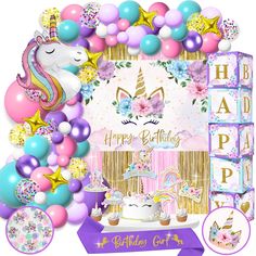 a unicorn birthday party with balloons and decorations