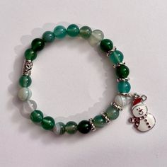 Part Of The 2024 Holiday Collection. Aaa+ Green Agate Swirl With Cute Snowman Charm. Beautiful Designer Gemstone Bracelet. Green Agate, Cute Snowman, Holiday Collection, Gemstone Bracelet, Womens Jewelry Bracelets, Jewelry Ideas, Swirl, Agate, Women Jewelry