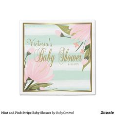 a baby shower sign with pink flowers on it