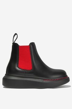 These Alexander McQueen unisex chealsea boots are where comfort meets luxury. Featuring a red strap deatil for a pop of colour, side zip and a slightly elevated heel. Your little one is bound to walk great places in these boots! Chealsea Boots, Leather Chelsea Boots, Great Places, Rubber Rain Boots, Favorite Things List, Side Zip, Chelsea Boots