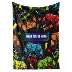 a black wall hanging with video game controllers on it and the words, your name here