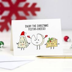 a christmas card with an image of two cheeses and the words enjoy the festive - cheese