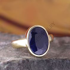 Raw Blue Sapphire Ring, Sapphire Gemstone Ring, Birthstone Ring, Sterling Silver Blue Yellow Gold Ring, Sapphire Jewelry, Valentines Gift ------------------------------- Size/Dimension (Approx) : All Sizes Available Gemstone : Raw Blue Sapphire Stone Shape : Oval Faceted Stone Size (Approx) : 14 x 10 mm Stone Color : Dark Blue ------------------------------- Please Note :-   Because you use good quality hand-selected gemstones Therefore, Colors and Inclusions of the Stone may Vary. I will Choose Blue Moonstone Ring With Accent Stones For Gift, Blue Oval Sapphire Ring With Stone Setting, Blue Moonstone Ring With Accent Stones As Gift, Oval Sapphire Ring With Stone Setting, Ring Saphir, Sapphire Silver Ring, Ring Sapphire, Blue Sapphire Ring, Ring Birthstone