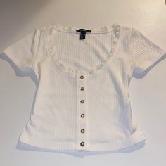 A Dainty Shirt Sleeve With Lace Trim And Button Detail. A Cute And Casual Essential Item. Forever 21 Button-up Tops With Buttons, Forever 21 Tops With Buttons For Spring, Forever 21 Fitted Tops With Button Closure, Fitted Forever 21 Tops With Button Closure, Forever 21 Summer Tops With Buttons, Forever 21 Tops With Buttons For Day Out, Forever 21 Short Sleeve Tops With Button Closure, Trendy Forever 21 Tops With Buttons, Forever 21 Fitted Everyday Top