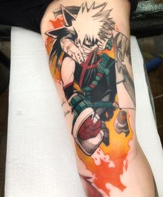 a person with a tattoo on their leg that has an image of the character gohan