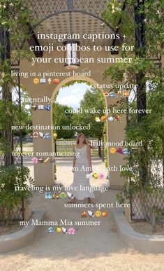 a woman standing in front of an arch with words written on it and trees around her