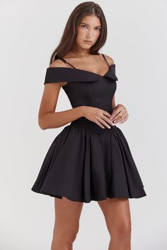 Step into the spotlight with our Elegant Off-Shoulder Mini Cocktail Dress, designed to make every moment memorable. This vintage-inspired, little black dress captures the essence of elegance with its flattering A-line silhouette and sensual off-the-shoulder neckline. Perfect for cocktail parties, evening events, or any special occasion where making an impression is a must. Product Features Fabric: High-quality blend of polyester and spandex, offering a slight stretch for a perfect fit. Style: Sleek, 'Hotsweet' style with a backless feature and a chic empire waistline that enhances your figure. Design: Timeless solid color with a smooth, synthetic fiber composition that ensures durability and comfort. Fit: Slim fit design that complements the natural contours of your body, highlighting your