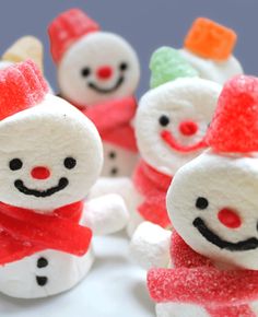 marshmallow snowmen with red scarfs and hats