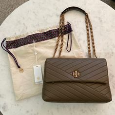 Reposhing This Item I Purchased From @Maynj. Loved It, But Ready To Rotate For Something New. Questions? Leave A Comment Below! Tory Burch Kira, Tory Burch Bags, Tory Burch Bag, Taupe Color, Tan Brown, Something New, Leather Shoulder Bag, Convertible, Tory Burch