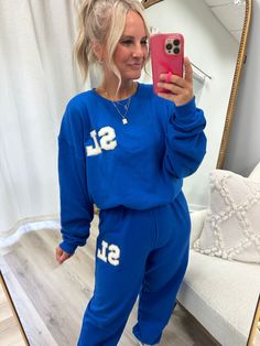 Ideal for lounging, running errands, or casual outings. Effortless style and comfort in one matching set. Feel confident and comfy PLUS these sets make the perfect gift for friends and family. Match with a Friend !Made with our Famous & Loved ‘UM Letter Patches’🏆 This Letter Patch Sweat Set is perfect for every season all year long. Get your two letter on the top & bottom of this cozy & personalized matching set! **Both items are unisex sized - most ladies size down in the pants** Blue Casual Sets For Fall, Casual Crew Neck Sets For Winter, Casual Winter Sets With Crew Neck, Winter Casual Loungewear Set, Casual Winter Loungewear Sets, Blue Activewear For Leisure In Spring, Sporty Activewear For Spring Lounging, Spring Crew Neck Activewear For Leisure, Blue Casual Activewear With Letter Print