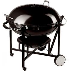 a large black grill with wheels on it's sides and the lid closed up