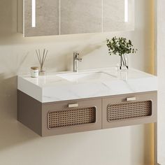 a bathroom sink sitting under a mirror next to a wall mounted faucet with two mirrors above it