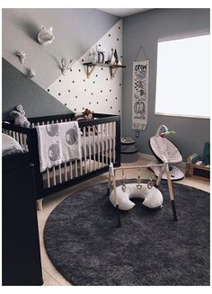 a baby's room with a black and white theme