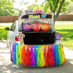 the trunk of a car decorated with streamers and saying you are a piece of god's plan