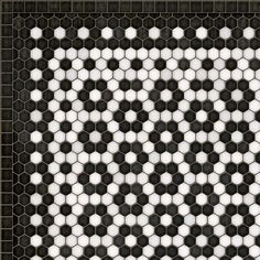 a black and white tile pattern that looks like hexagonal tiles