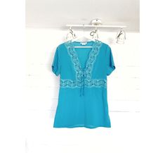 Italian Vintage Blue Short Sleeves Lace Blouse for Women Size - Etsy Latvia Stretch Lace Top With Short Sleeves, Fitted Blue Lace Top For Summer, Fitted Blue Lace Top, Blue Fitted Lace Top, Stretch Lace Trim Short Sleeve Blouse, Summer Lace Top Blouse With Short Sleeves, Fitted Blue Lace Top Blouse, Short Sleeve Lace Top For Summer, Fitted Blue Lace Top With Lace Trim