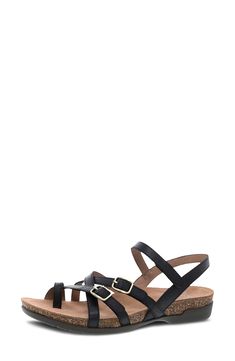 A strappy leather upper seals the summery status of this adjustable sandal set on a contoured cork footbed for optimal comfort. Adjustable hook-and-loop straps Leather upper and lining/rubber sole Imported Adjustable Slingback Leather Footbed Sandals, Adjustable Slingback Footbed Sandals With Leather Footbed, Black Cork Sandals With Buckle Closure, Strappy Footbed Sandals With Cork-bed Midsoles For Beach, Beach Strappy Sandals With Cork-bed Midsoles, Strappy Beach Sandals With Cork-bed Midsoles, Strappy Beach Footbed Sandals With Cork-bed Midsoles, Summer Ankle Strap Cork Sandals, Summer Cork Sandals With Ankle Strap