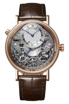 Tradition watch in 18-carat gold with retrograde date. Self-winding anthracite movement. Silicon Breguet... balance-spring. Off-centred dial in gold, engine-turned by hand. Sapphire caseback. Water-resistant to 3 bar (30 m). Diameter: 40 mm. Breguet has been a pioneer in the watchmaking industry since 1775, all the while honoring tradition and artistry through its craftsmanship. The Manufacture has introduced the world of timekeeping to countless technological inventions throughout the last two centuries, including the first self-winding watch in 1780 and the first wrist chronograph in 1820. Breguet timepieces have earned a unique renown for their exquisite detailing and historic relevance. Today, Breguet watches remain synonymous with the principles of elegance, precision and innovation. Most Expensive Rolex, Mens Rose Gold Watch, Swiss Army Watches, Authentic Watches, Rose Gold Case, Bracelet Cuir, Rose Gold Watch, Luxury Watches For Men, Beautiful Watches