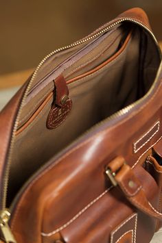 Image Classic Cognac Cases With Leather Lining, Classic Brown Vegetable Tanned Leather Briefcase, Classic Satchel With Interior Card Slots, Luxury Bridle Leather Briefcase With Leather Lining, Leather Crafts, Leather Briefcase, Fun Bags, Leather Craft, Made In The Usa