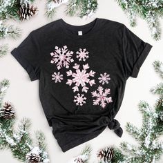 Christmas T-Shirt Snowflake Shirt Cute Christmas Shirt Pink Christmas Shirt Snowflakes TShirt Girly Christmas T-shirts Pink Snowflake Shirt Christmas Gift Shirt Tshirt Christmas Cute Women's Christmas T-shirt  Christmas tshirt with a cute pink snowflake pattern makes the cutest statement this holiday season. Perfect tshirt for a Christmas party or a tshirt for everyday wear during the holiday season! Soft and lightweight, with the right amount of stretch, it's comfortable and flattering for all. Pink Christmas Shirt, Snowflake Shirt, Pink Snowflake, Girly Christmas, Cute Christmas Shirt, Cute Christmas Shirts, Christmas T Shirts, Rose T Shirt, Christmas Tshirt