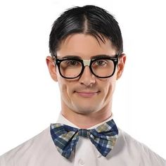 a man wearing glasses and a bow tie