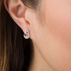 Treat her to the sparkle of these darling fashion drop earrings. Crafted in cool 10K white gold, each sweet earring features a glistening teardrop-shaped outline that loops into a dainty heart at the top - all artfully adorned with sparkling petite diamonds. The final touch: a 3.0mm lab-created bright pink sapphire is nestled at the base of the design. Radiant with 1/6 ct. t.w. of diamonds and a brilliant buffed luster, these post earrings secure comfortably with friction backs. Heart Knot, Sweet Earrings, Peoples Jewellers, Final Touch, Diamond Heart, Teardrop Earrings, Pink Sapphire, Bright Pink, Post Earrings