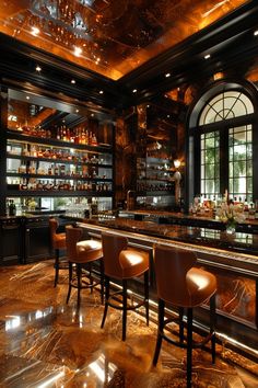 an elegant bar with gold and black decor