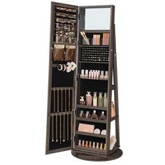 a tall wooden display case filled with lots of cosmetics and personal care items on top of it