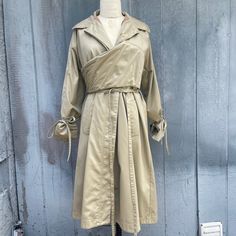 unbelievable designer trenchcoat from 2018 runway  iconic Mexican Designer Sanchez Kane  one size  Genderless  message me for measurements  Due to the nature of vintage, all items in my store are sold as is. All sales are final without exception, I have a no returns/refunds policy. However, please contact me if there is a problem with your order. Please refer to the FAQs at the bottom of the page of my main store for my shop policies. By purchasing from my shop you are agreeing to my shop policies. Spring Gabardine Long Raincoat, Spring Khaki Gabardine Outerwear, Oversized Beige Raincoat For Spring, Khaki Long Raincoat For Spring, Spring Khaki Raincoat With Pockets, Runway Iconic, 2018 Runway, Khaki Jacket, Mexican Designs