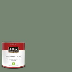 a can of behr ultra paint in dark brown