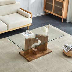 a living room with a couch, chair and coffee table