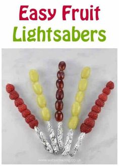 four different types of fruit on sticks with the words easy fruit lightsabers