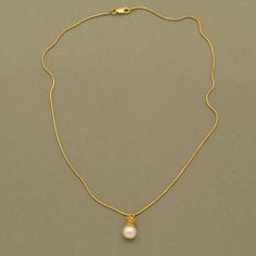 The white cultured pearl is the focal point of this noble pendant. The passage from the eyelet to the golden necklace is in the form of fine vaulted plates made of gold-plated silver. They provide the pendant with a fanciful and yet graceful character. Suitable with this pendant are the matching drop earrings we offer here in our shop. Dimensions: width : 8 mm, height: 1.6 cm Delicate Gold Pearl Necklace With Pearl Pendant, Gold Beaded Pearl Pendant Necklace, Classic Gold Pearl Necklace With Round Pendant, Gold Pearl Necklace With Heart Pendant, Dainty Gold Pendant Pearl Necklace, Gold Necklaces With Pearl Drop Round Pendant, Gold Pearl Necklace With Round Pendant, Gold Necklace With Round Pearl Pendant, Delicate Gold Pearl Necklace With Round Pendant