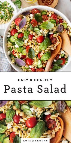 pasta salad with tomatoes and spinach in a white bowl