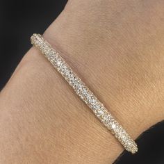 Why we love it: This vintage diamond bracelet is encrusted with 5 carats of diamonds and has a luxurious, substantial feel. Highlights: - Very well maintained estate piece - 5 carats of bright white and eye clean diamonds - Satisfying weight at 12.2 grams - Hinged bangle design with very secure clasp and double safety locks - Solid 14k yellow gold Dimensions: 4.6mm in width. Inside dimensions 2.25 x 2.15 inches An appraisal is available upon request. All of our pieces come with a 30 day return p Solid Gold Bangle Bracelet, Vintage Diamond Bracelet, Solid Gold Bangle, Bangle Design, Pave Bangle, Edwardian Style, Big Diamond, Bangle Designs, Gold Bangle Bracelet