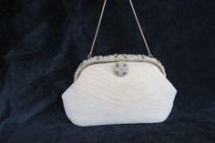 "This gorgeous vintage handbag is labelled as being hand made by K&G Charlet, see pictures, and it features a stunning all-over beaded design. This bag has lovely mid century style; it is made in a beautiful beige and white color scheme with a grey beaded design to the lock closure and top of the bag, gold hardware, and it has a small gold chain as the handle. This lovely little bag is beautiful and sturdy enough for every day use, or it would look wonderful as part of a collection. This purse i Vintage Wedding Clutch Shoulder Bag, Vintage Handheld Shoulder Bag For Weddings, Handmade Retro Shoulder Bag For Evening, Vintage Handheld Shoulder Bag For Wedding, Vintage Handmade Clutch For Formal Occasions, Handmade Vintage Clutch For Formal Occasions, Vintage Handheld Evening Bag For Weddings, Retro Beaded Bags For Wedding, Retro Beaded Bag For Wedding