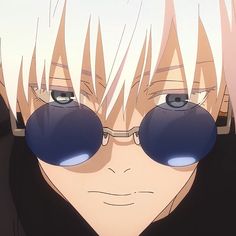 an anime character wearing glasses and looking at the camera