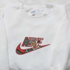 The Nike x Ken Kaneki Anime Embroidered Sweatshirt is a must-have for Tokyo Ghoul fans. This hoodie features intricate embroidery of the iconic Ken Kaneki character, showcasing your love for the anime series. Made with premium quality materials, it ensures comfort and durability. The sweatshirt’s cozy interior keeps you warm, making it perfect for chilly days. Its stylish design and attention to detail make it an ideal gift for your family members, especially for birthdays. Give them a pre Embroidered Sweatshirt For Streetwear In Winter, Embroidered Sweatshirt For Winter Streetwear, White Hoodie With Embroidered Graphics For Fall, White Fleece Sweatshirt With Embroidered Logo, White Hoodie With Embroidered Graphics, White Crew Hoodie With Embroidered Graphics, Streetwear Embroidered Fleece Sweatshirt, White Hoodie With Custom Embroidery For Winter, White Custom Embroidered Hooded Sweatshirt