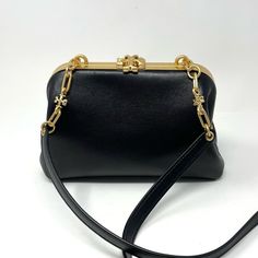 Authentic Tory Burch Cleo Small Leather Shoulder Bag Crossbody In Black With Gold Tone Hardware. Approximate Measurements: W 8.5"/ H 6" / D 4" / Strap Drop 22" Minor Signs Of Surface Scratching To Leather And Scratching/ Tarnishing To Hardware. Overall This Bag Is In Really Good Condition. All Pictures Are Of Actual Bag. Shipped From A Smoke Free Home With Tory Burch Dust Bag. Tory Burch Bag, Leather Shoulder Bag, Bags Handbags, Tory Burch, Gold Color, Dust Bag, Bag Lady, Shoe Accessories, Women Accessories